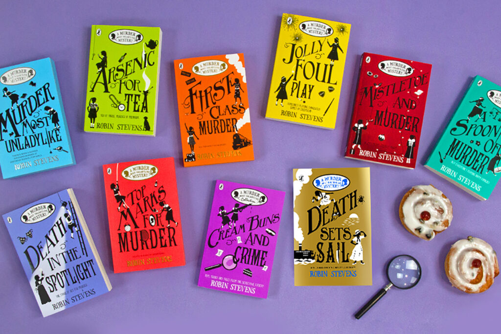 A photo of all the books in the Murder Most Unladylike series on a purple background